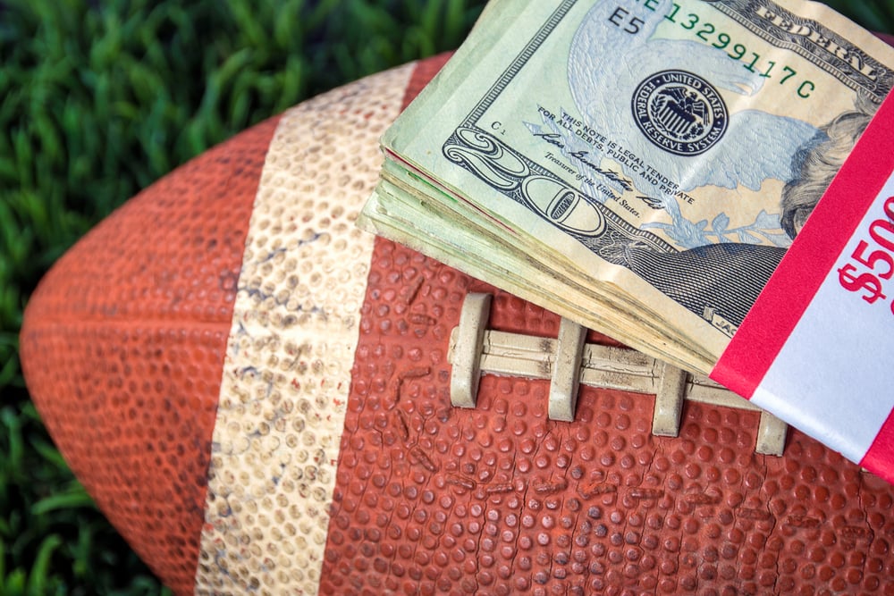 American football with cash