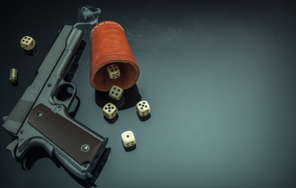 gun, dice, and bullet