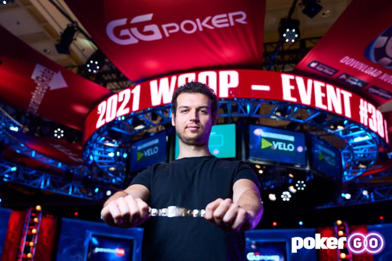 Michael Addamo holding his WSOP bracelet