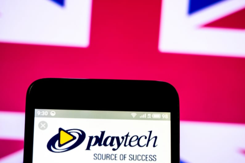 Playtech logo on a smartphone
