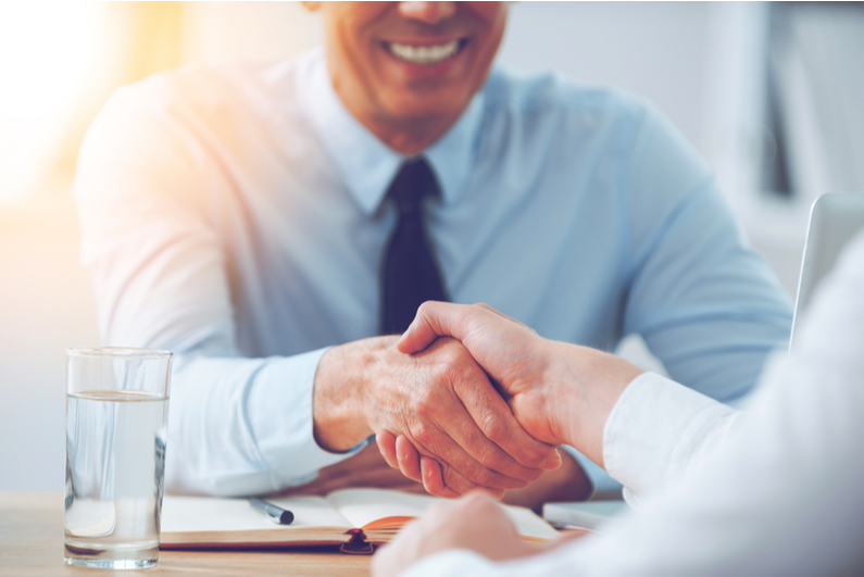 Businessman shaking on a deal