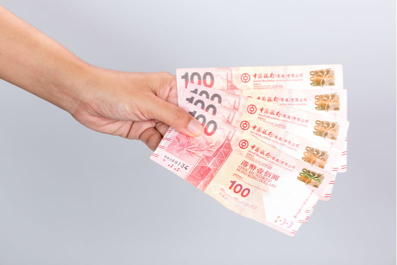 Hand holding Hong Kong dollars