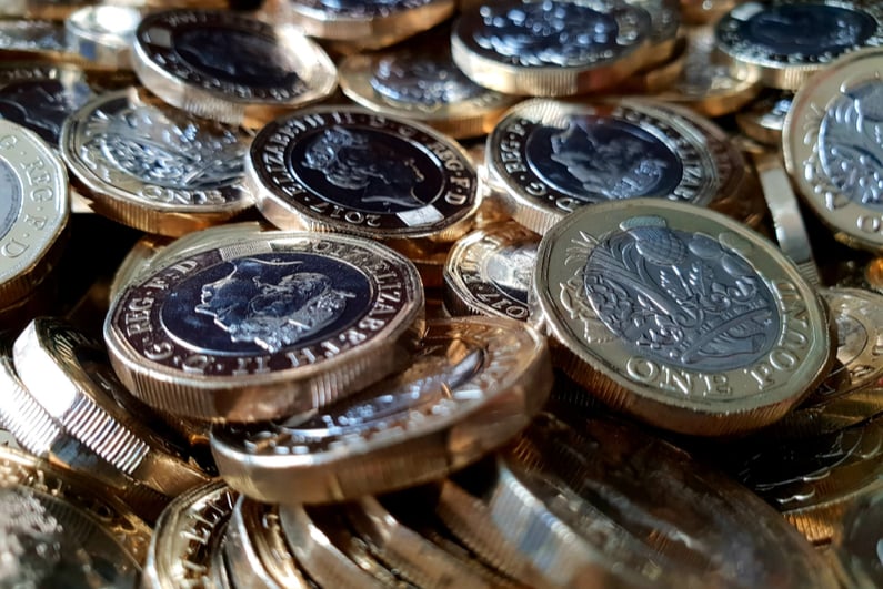 Pile of British pound coins