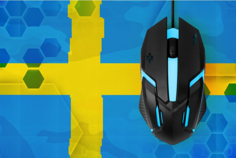 Gaming mouse on a Swedish flag