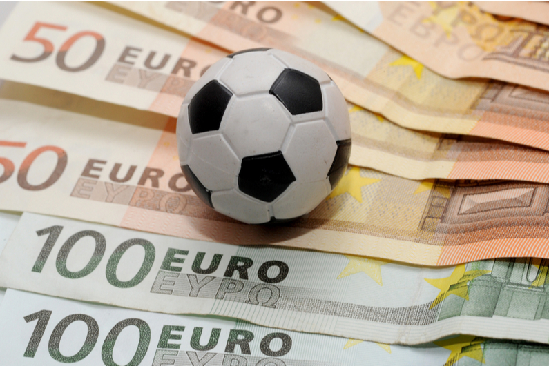Soccer ball on Euro currency