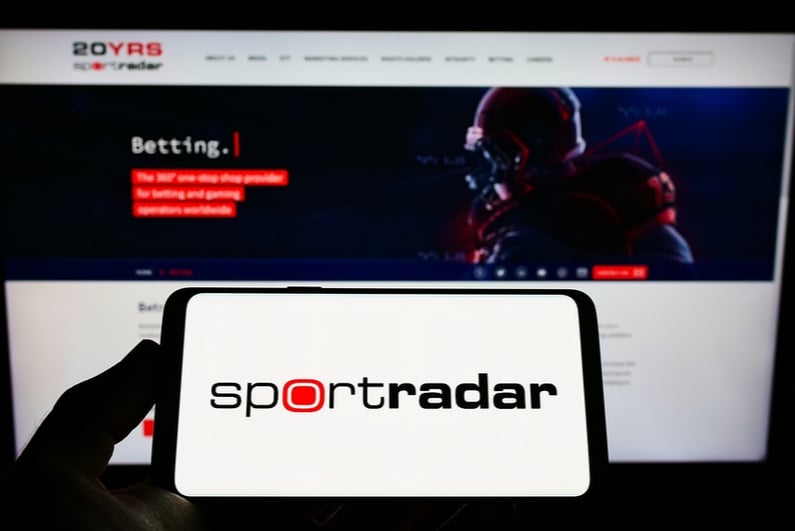 Sportradar logo on a smartphone