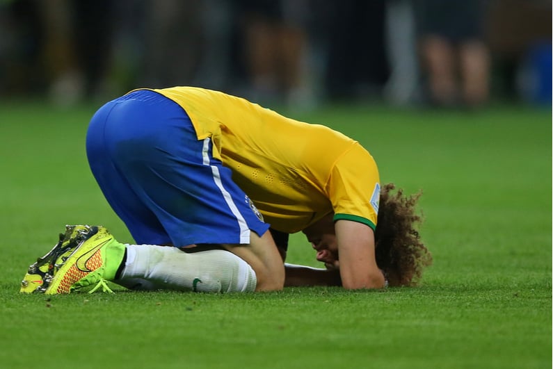 David Luiz with head on floor