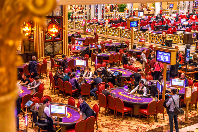 Gamblers inside The Venetian Casino in Macau