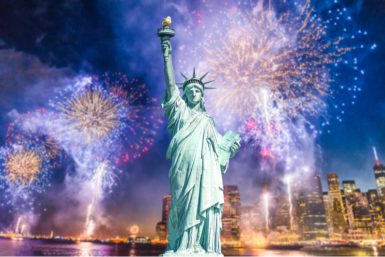 Statue of Liberty against fireworks background