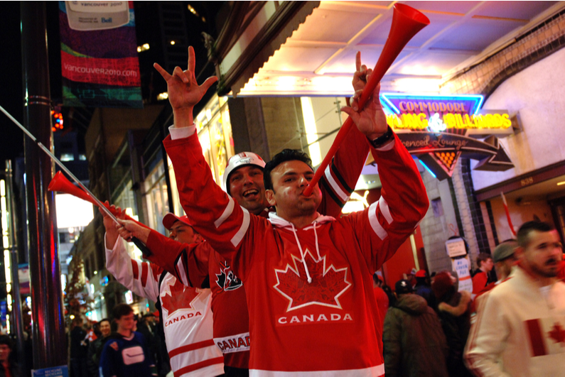 Canadian sports fans celebrating a hockey win