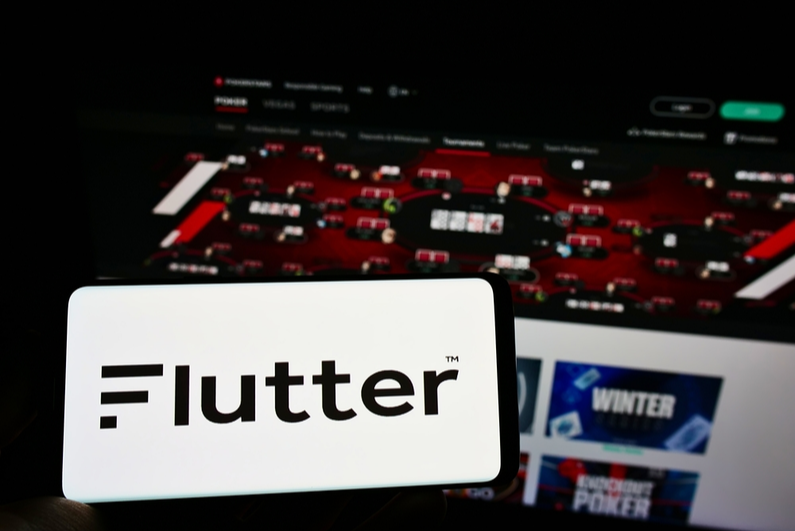 Flutter logo on a smartphone