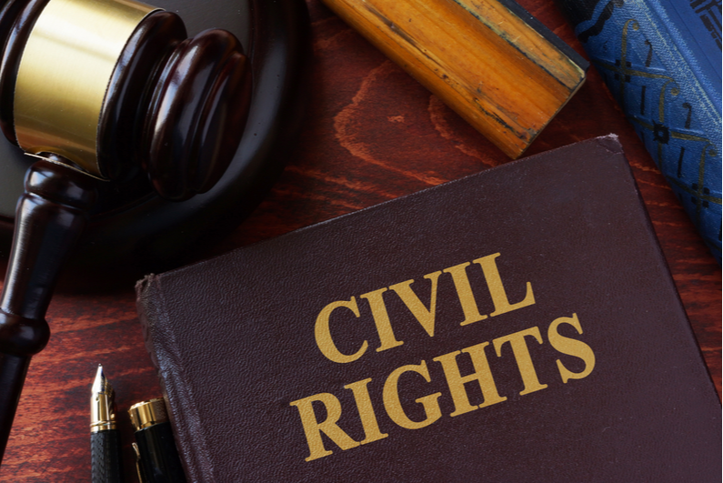 gavel next to a book titled "CIVIL RIGHTS"