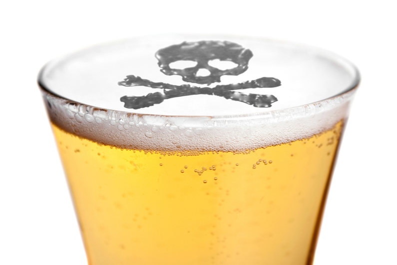 Skull and crossbones on beer foam
