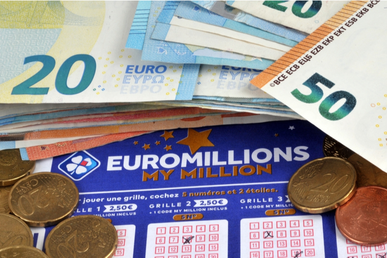 EuroMillions lottery ticket and cash