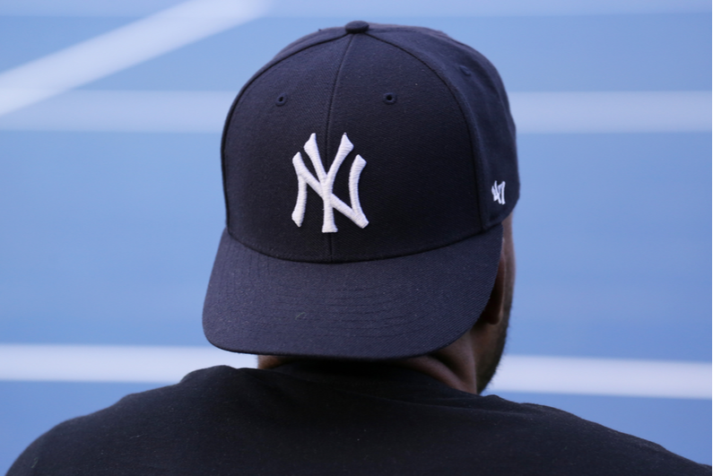 Man wearing a Yankees cap