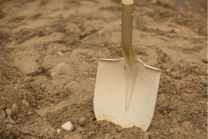 Shovel breaking ground