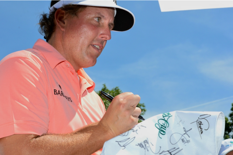 Phil Mickelson signing an autograph