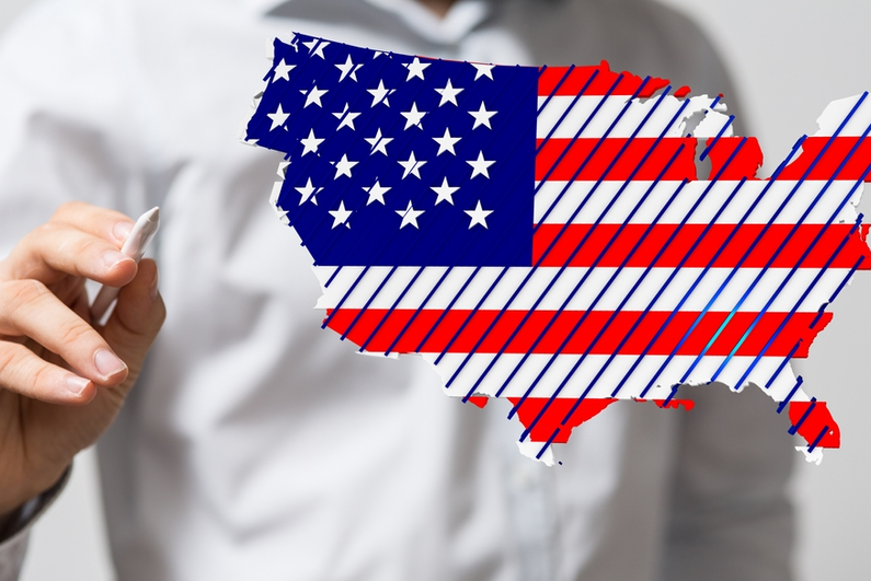 man drawing a map of the united states