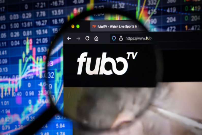 FuboTV logo with arrows in the background