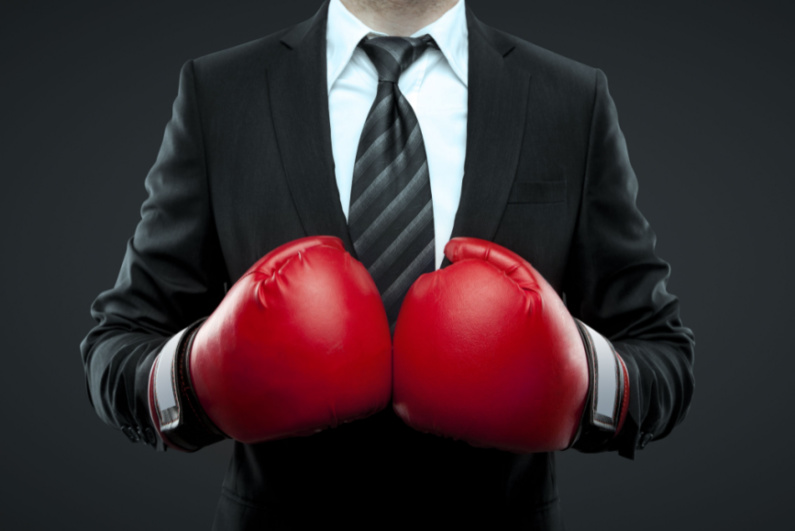 Businessman with boxing gloves