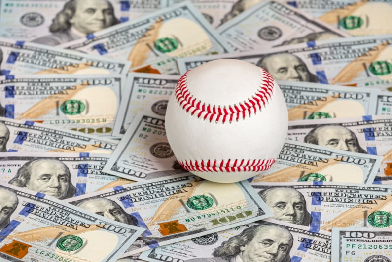 Baseball on top of cash