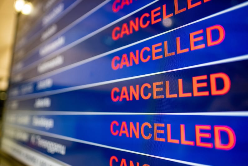 Flight board showing cancelled flights