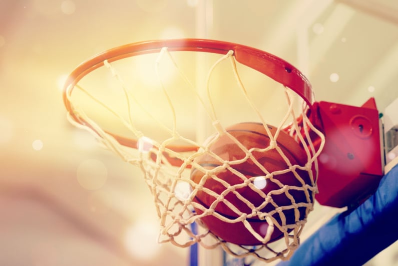 Basketball goes through the net