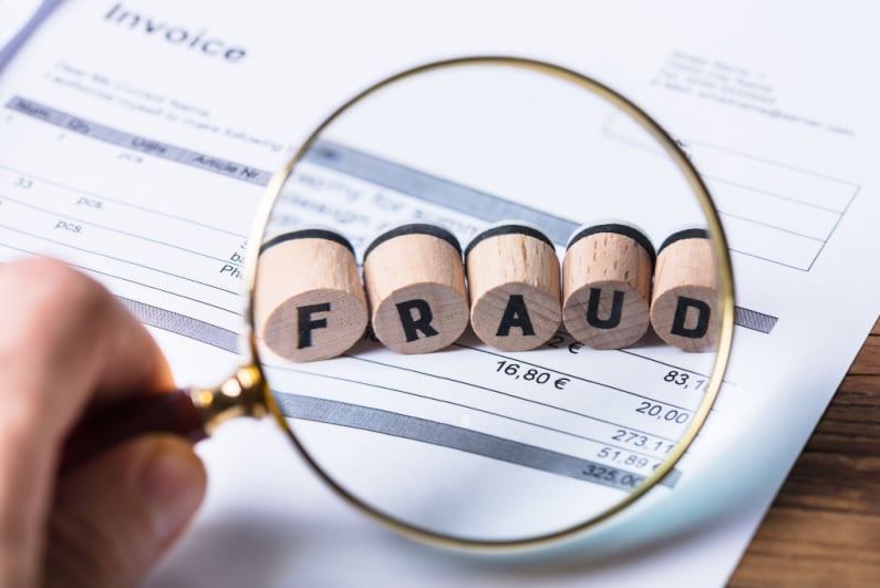 Fraud spell blocks above the financial statement