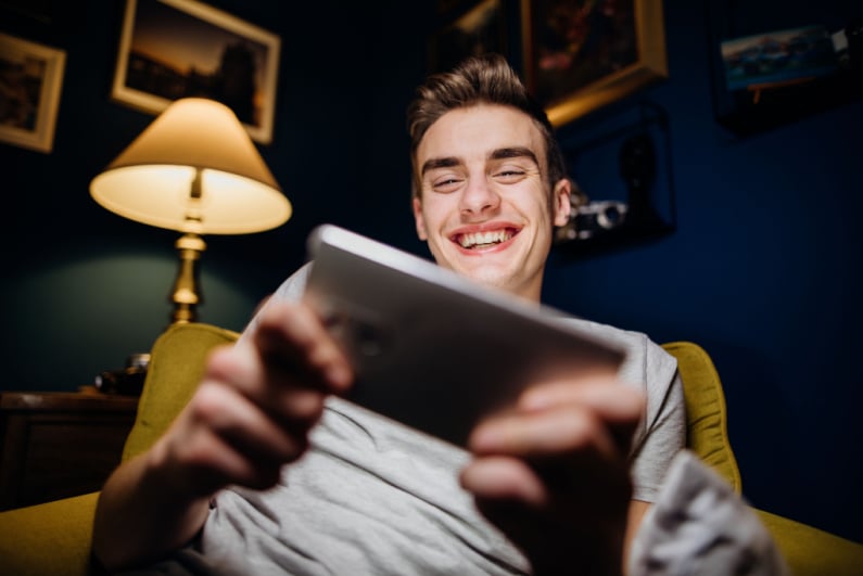 Young man smiling on the phone