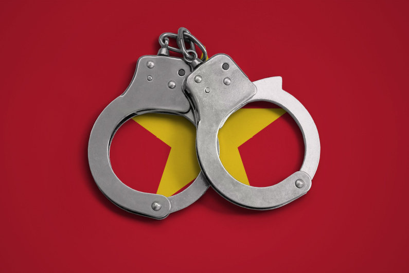 Vietnam flag and handcuffs