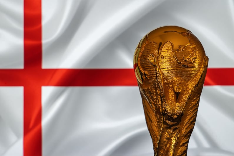 World cup in front of the flag of England