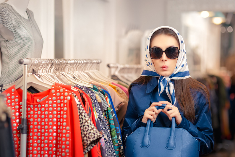 Female mystery shopper wearing sunglasses