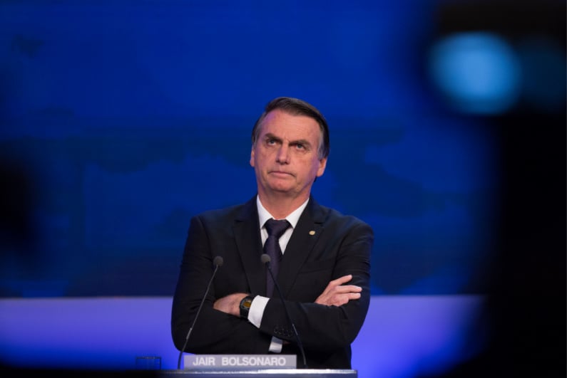 Jair Bolsonaro crossing his arms