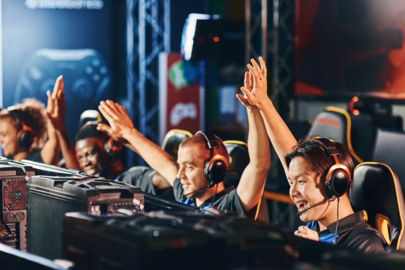 A team celebrates its victory in esports