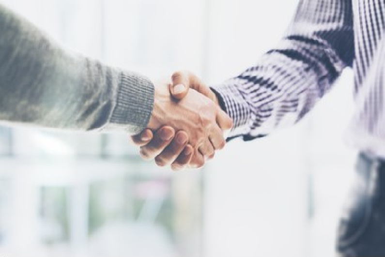 Two men shaking hands