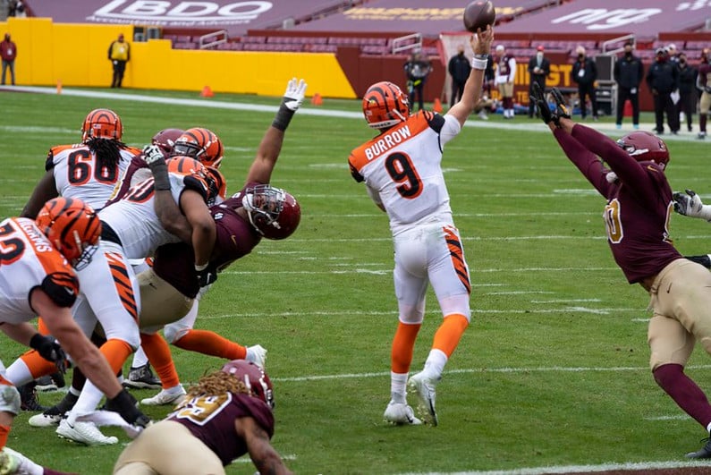 Joe Borough throws a pass