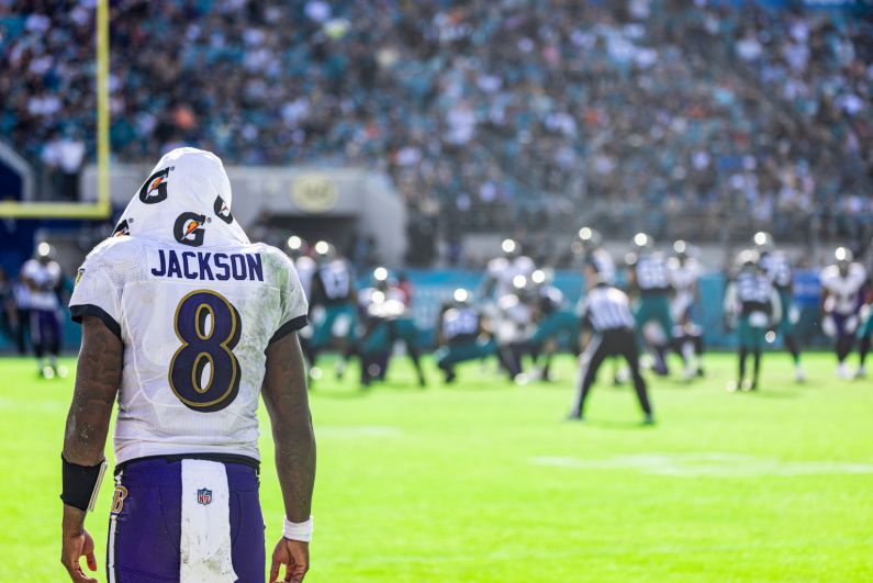 Lamar Jackson on the sideline during a game