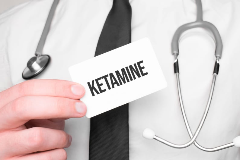 Doctor with Ketamine card