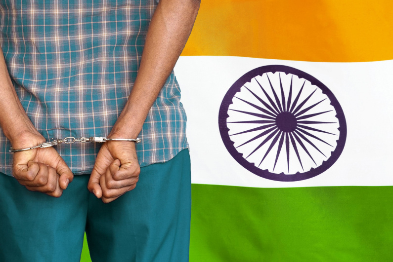 India flag with man in handcuffs