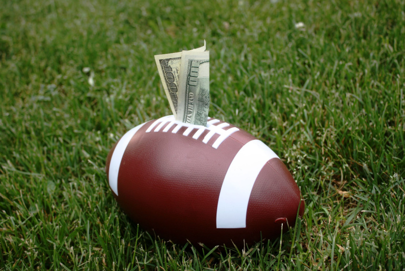 American football with money