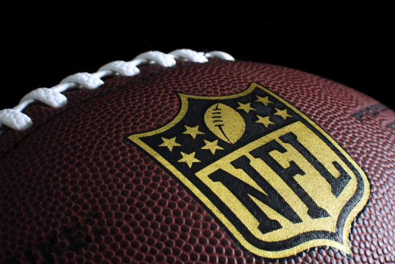 Closeup of NFL logo on a football