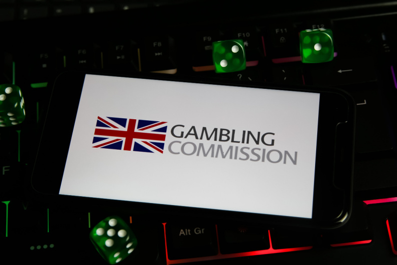 UK Gambling Commission logo on a phone