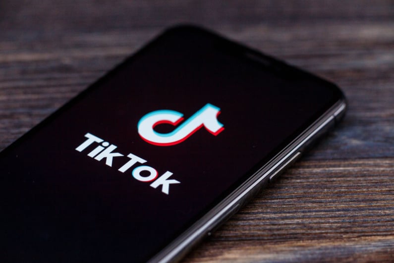 TikTok logo on phone