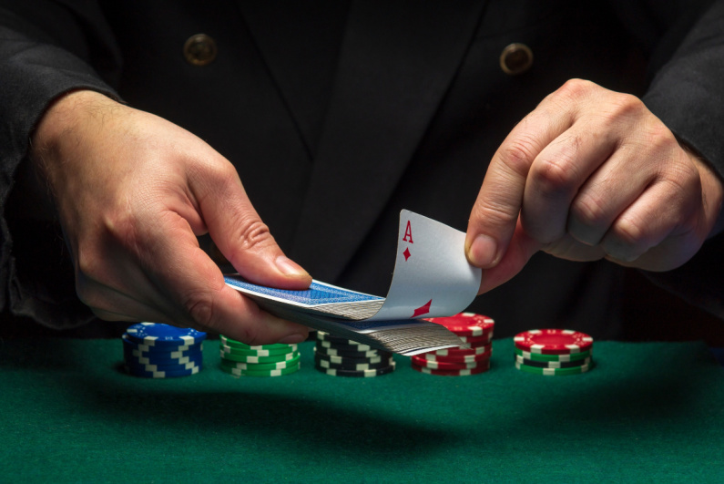 Person rigging a deck of cards