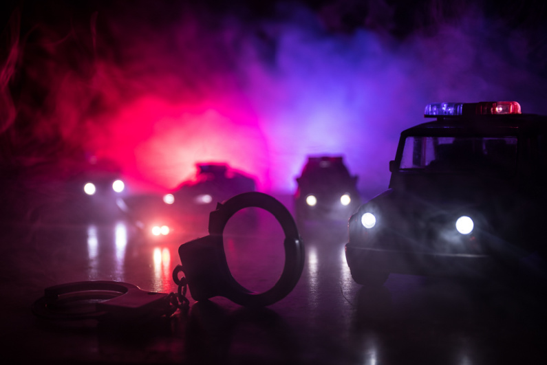 Dark police car scene