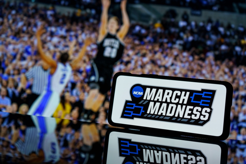 March Madness logo on phone