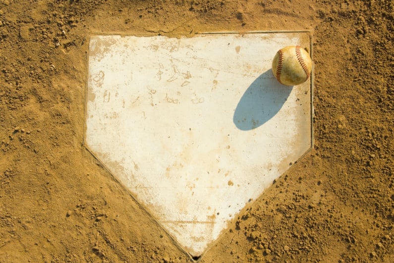 Baseball on home plate