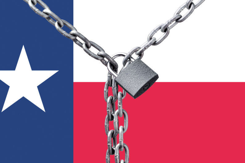 Locked chain over Texas flag