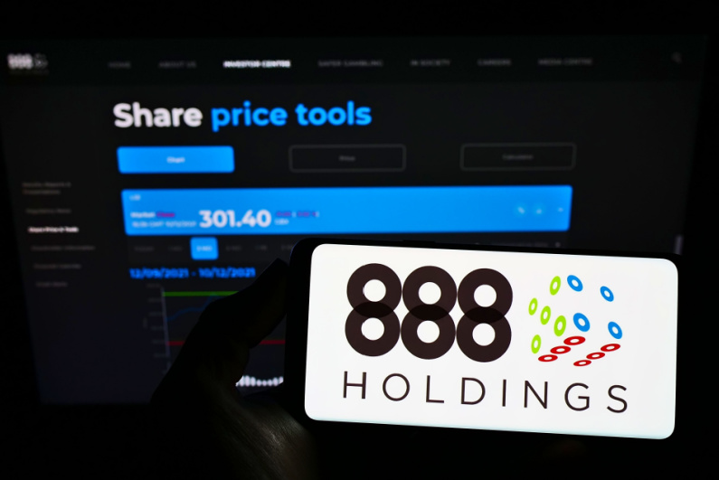 888 Holdings logo on phone