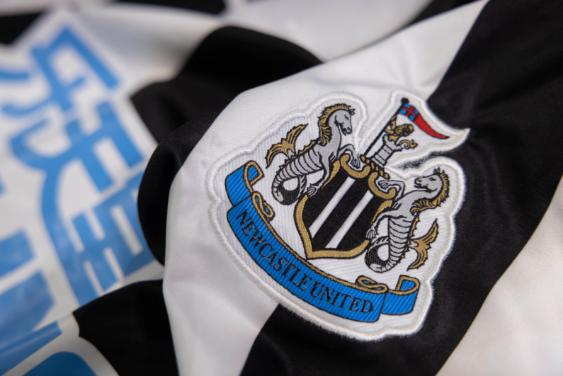 Newcastle United logo on jersey